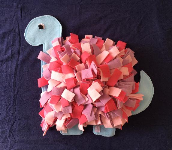 A Dogosaur Exclusive The Sniffasaurus Snufflemat For Dogs! Dogosaur have teamed up with “Ruby Dog Toys” to bring you the UKs FIRST, Dinosaur snufflemat! -THE SNIFFASAURUS!-